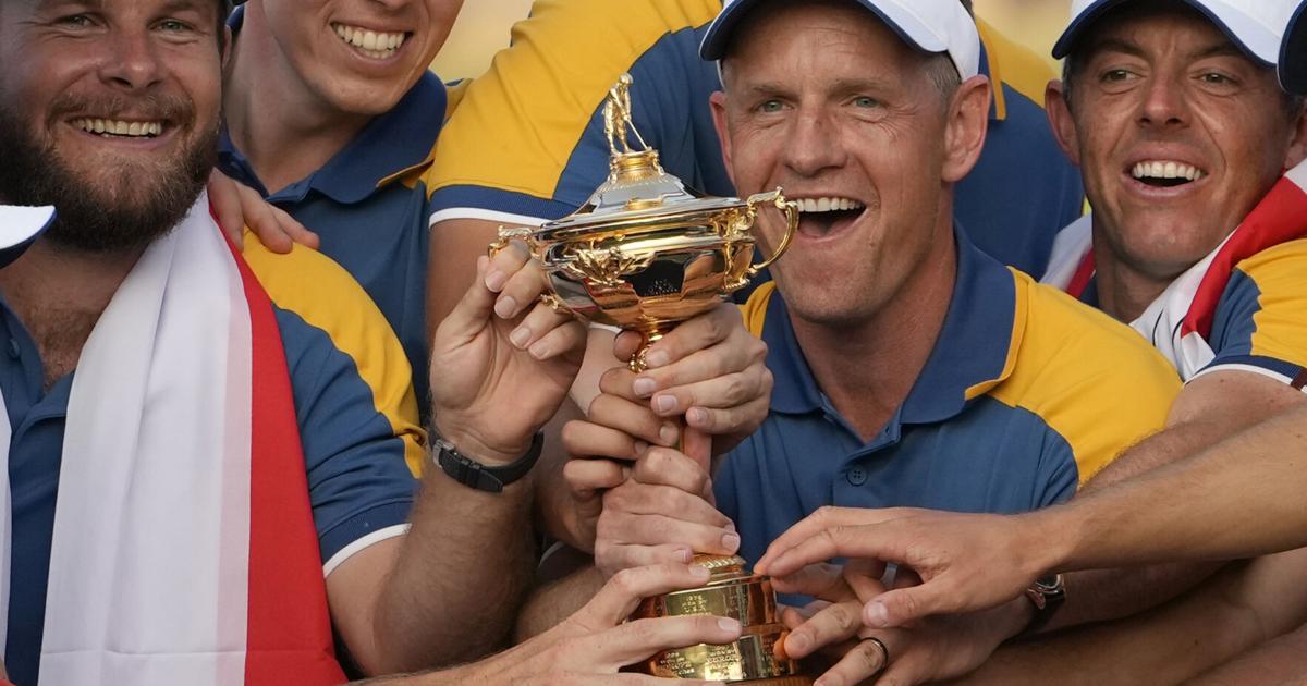 Luke Donald, Europe's 2025 Ryder Cup Captain, holding a golf club on the course